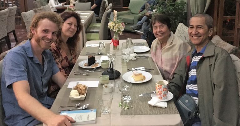 Giles Short with Alessandra, Joppee and his wife having dinner at a restaurant in Baguio