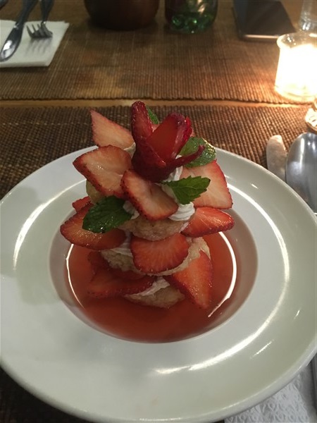 An elegant tower of strawberries and cream for dessert