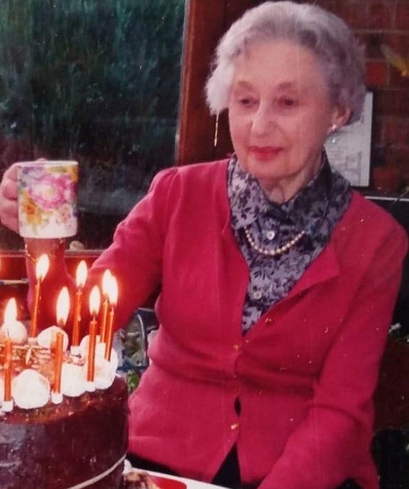 Gran with her candlelit birthday cake