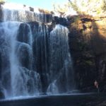 Giles Short on rock beneath Big waterfall