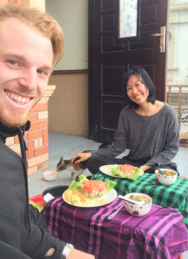 Giles Short selfie with Vietnamese girl and her cat, with vegan food lunch